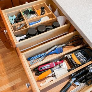 a drawer with many tools in it